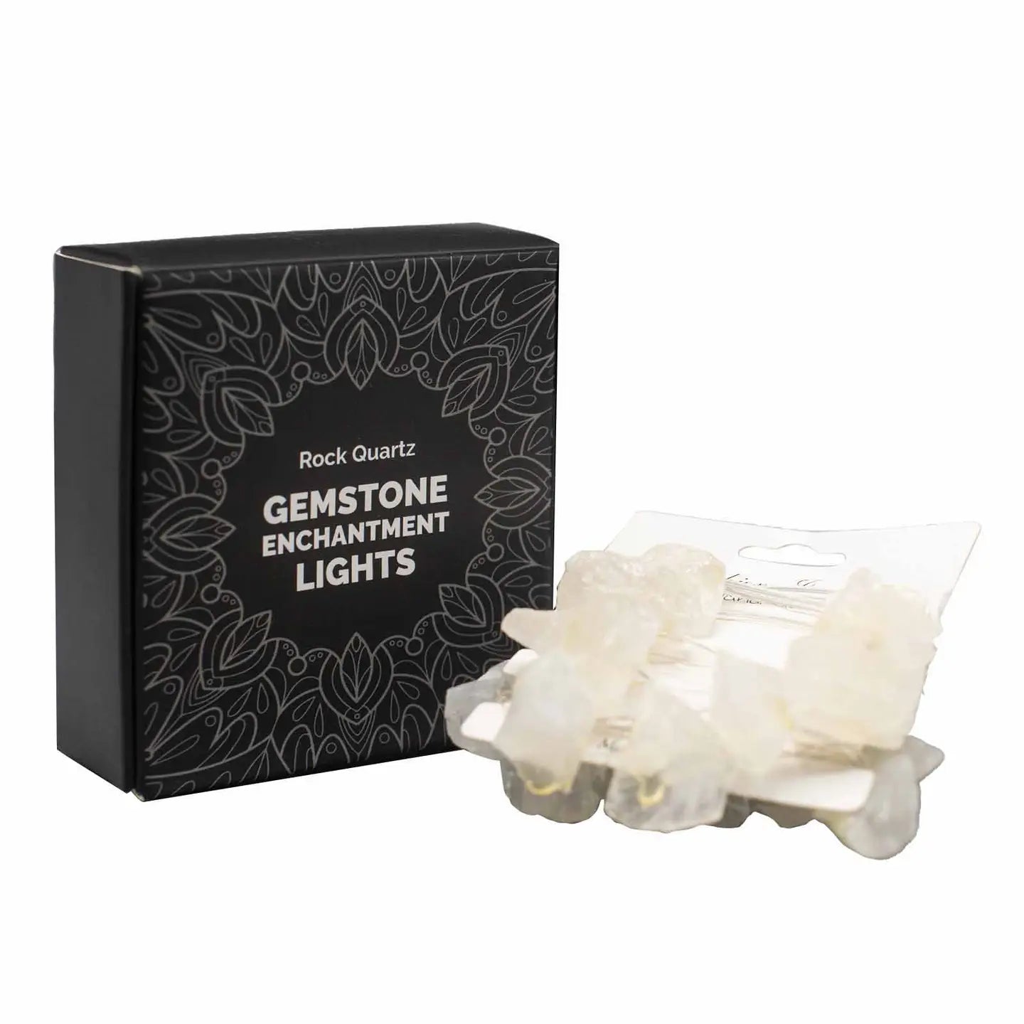 "Rock Quartz Crystal Lights on card wrap in front of black box on white background"