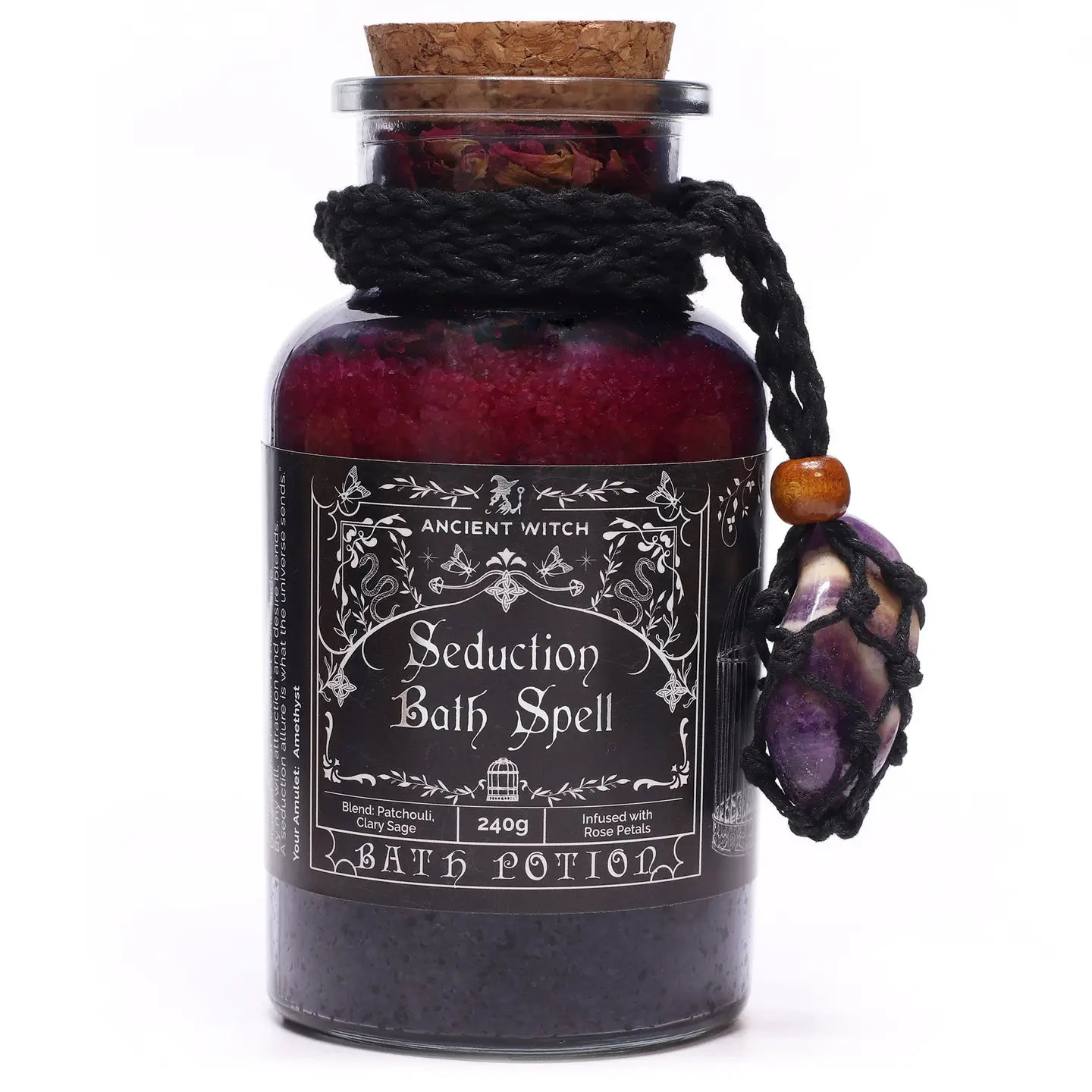 "Seduction" Bath Spell glass jar with cork lid and macrame necklace with Amethyst crystal on white background"