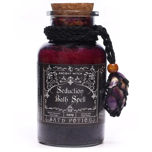 "Seduction" Bath Spell glass jar with cork lid and macrame necklace with Amethyst crystal on white background"