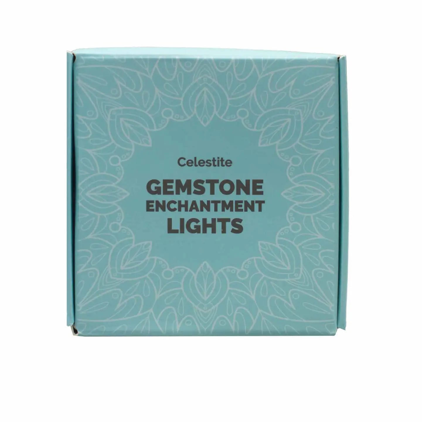 "Celestite Crystal Lights ice blue square box with white decoration and black writing on white background"