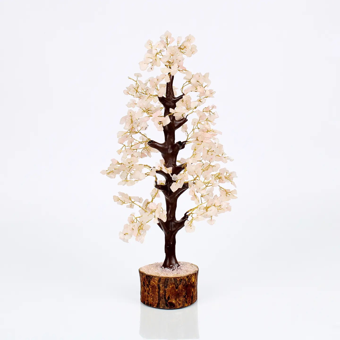 "Rose Quartz Crystal Tree with 500 beads on branches in wooden base with crushed rose quartz on white background"