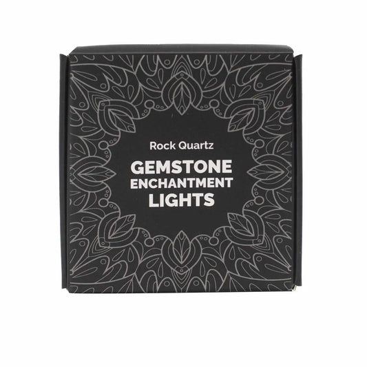 "Rock Quartz Crystal Lights black square box with white pattern and writing on white background"